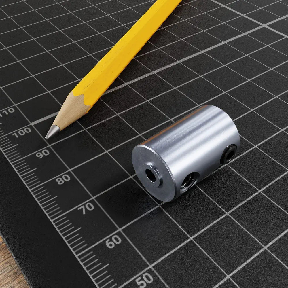 ServoCity セットスクリュー シャフトカプラー (3mm ラウンドボア to 1/4" ラウンドボア)